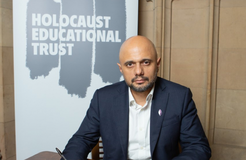 Sajid Javid MP signing the 2023 Holocaust Book of Commitment. 